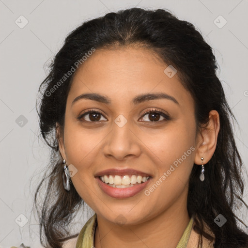 Joyful latino young-adult female with long  brown hair and brown eyes