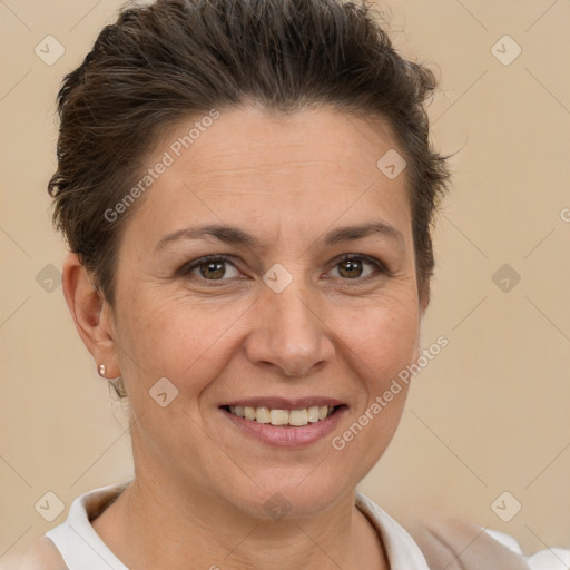 Joyful white adult female with short  brown hair and brown eyes