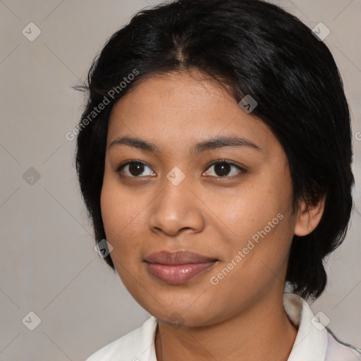 Joyful latino young-adult female with medium  black hair and brown eyes