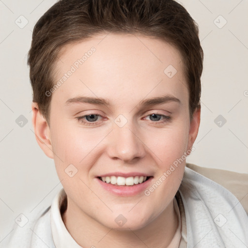 Joyful white young-adult female with short  brown hair and grey eyes