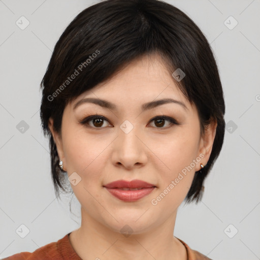 Joyful asian young-adult female with medium  brown hair and brown eyes