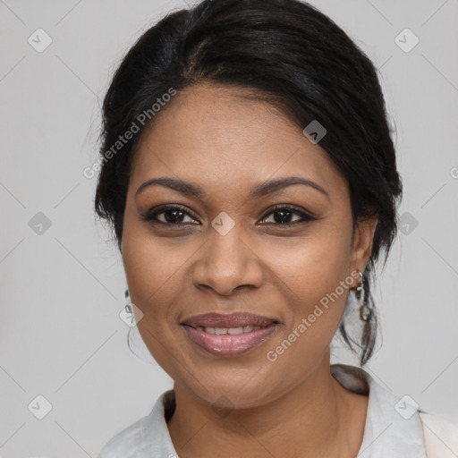 Joyful black young-adult female with medium  black hair and brown eyes