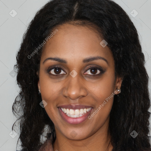 Joyful black young-adult female with long  brown hair and brown eyes