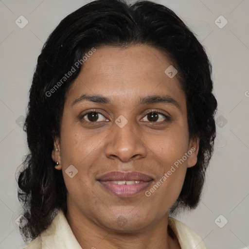 Joyful latino young-adult female with medium  brown hair and brown eyes