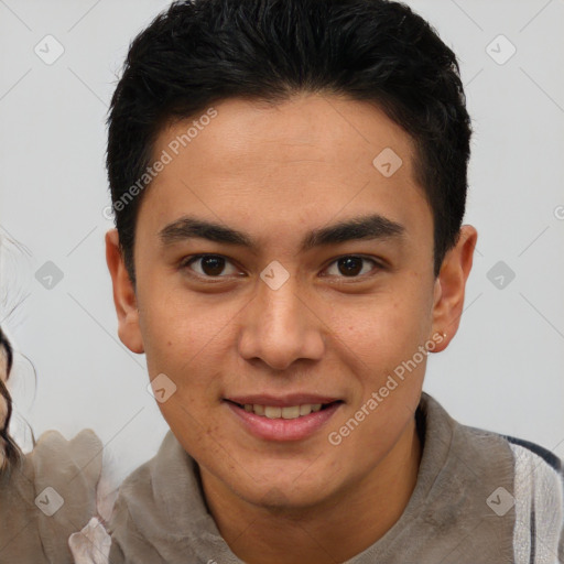 Joyful latino young-adult male with short  brown hair and brown eyes