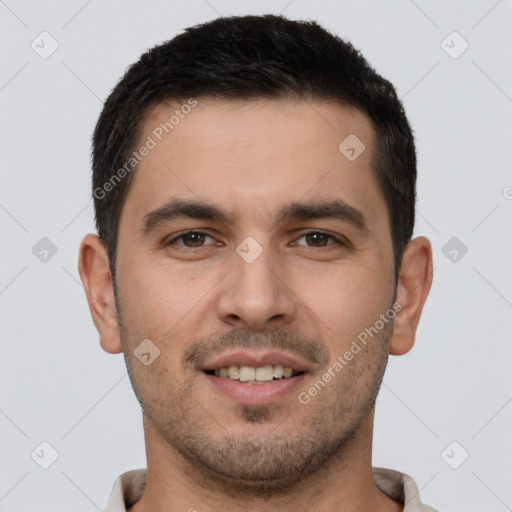 Joyful white young-adult male with short  brown hair and brown eyes