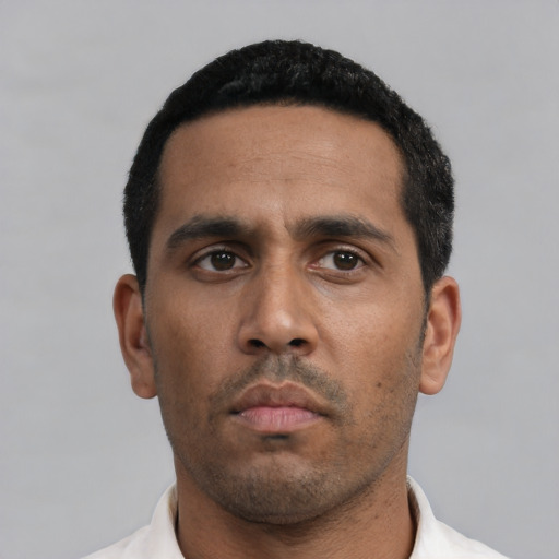 Neutral black young-adult male with short  black hair and brown eyes