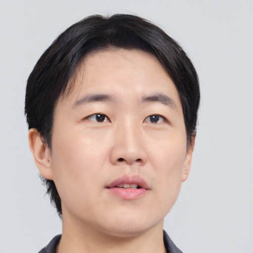 Neutral asian young-adult male with short  black hair and brown eyes
