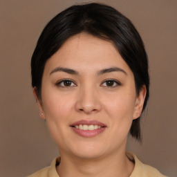 Joyful white young-adult female with medium  brown hair and brown eyes