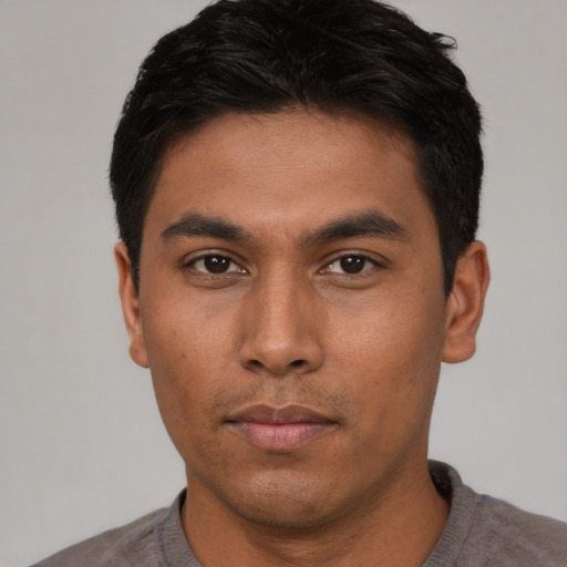 Neutral asian young-adult male with short  black hair and brown eyes