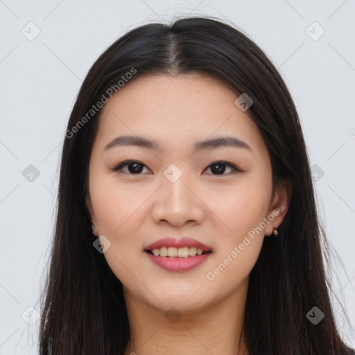 Joyful asian young-adult female with long  brown hair and brown eyes