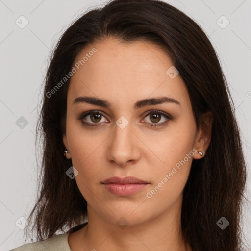 Neutral white young-adult female with long  brown hair and brown eyes