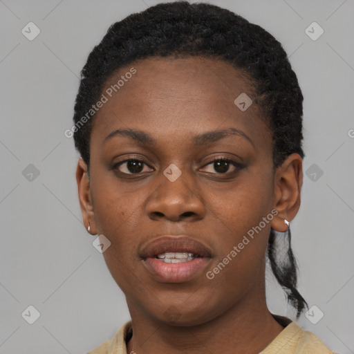 Joyful black young-adult female with short  black hair and brown eyes