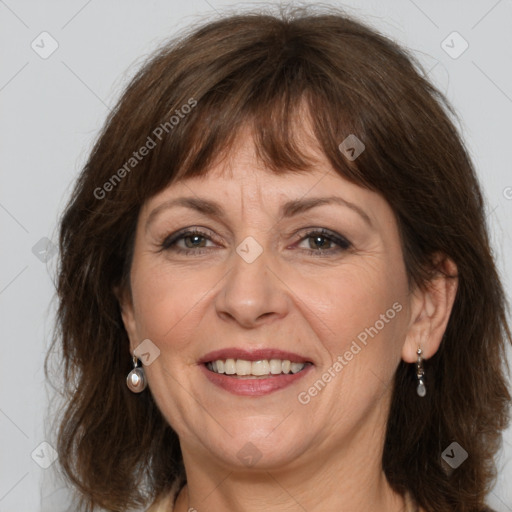 Joyful white adult female with medium  brown hair and grey eyes