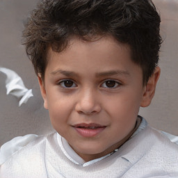 Joyful white child male with short  brown hair and brown eyes