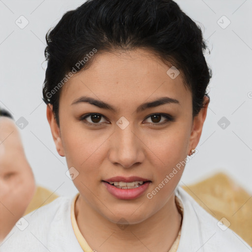 Joyful asian young-adult female with short  brown hair and brown eyes