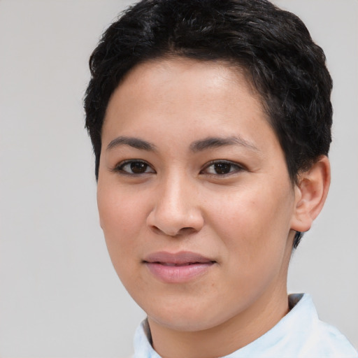 Joyful asian young-adult female with short  brown hair and brown eyes
