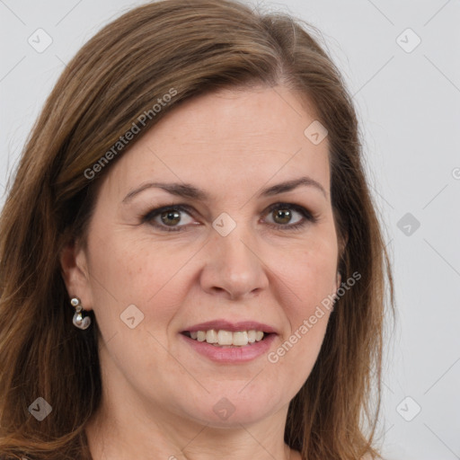 Joyful white adult female with long  brown hair and brown eyes