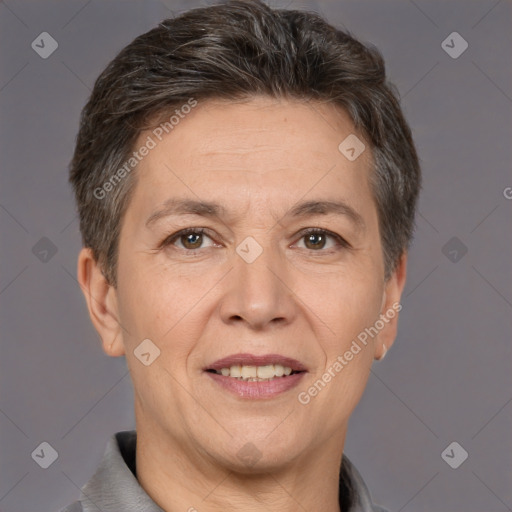 Joyful white adult female with short  brown hair and brown eyes