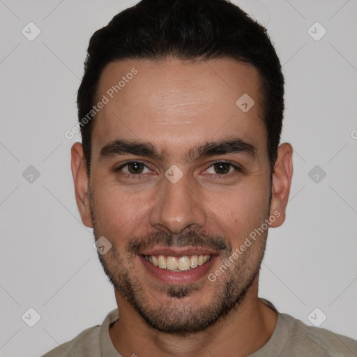 Joyful white young-adult male with short  brown hair and brown eyes