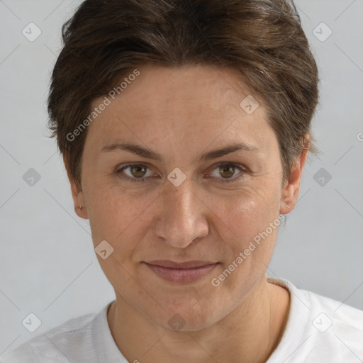 Joyful white adult female with short  brown hair and grey eyes