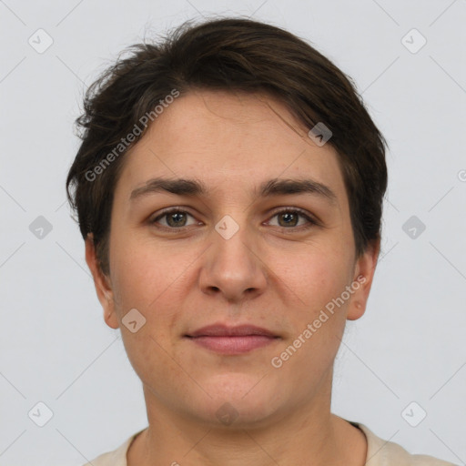 Joyful white young-adult female with short  brown hair and brown eyes