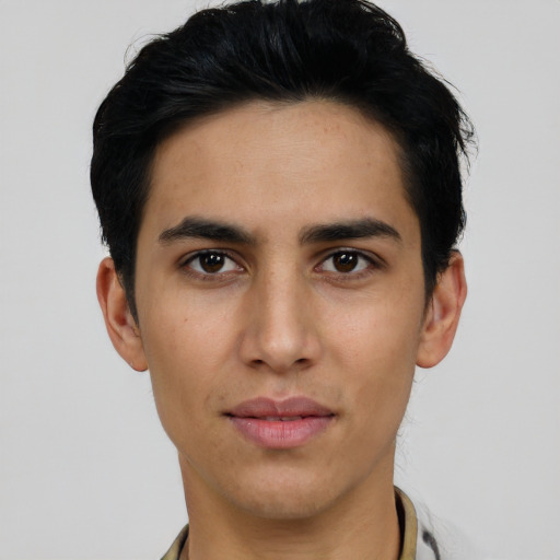 Joyful asian young-adult male with short  black hair and brown eyes