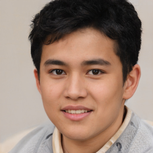 Joyful latino young-adult male with short  brown hair and brown eyes