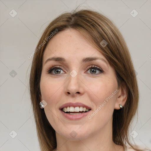 Joyful white young-adult female with medium  brown hair and green eyes