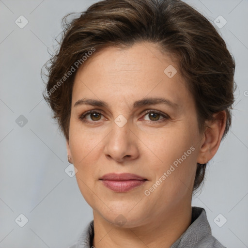 Joyful white adult female with short  brown hair and brown eyes