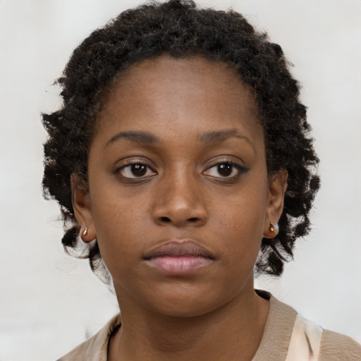 Neutral black young-adult female with short  brown hair and brown eyes