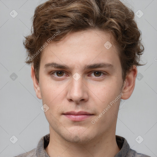 Neutral white young-adult male with short  brown hair and grey eyes