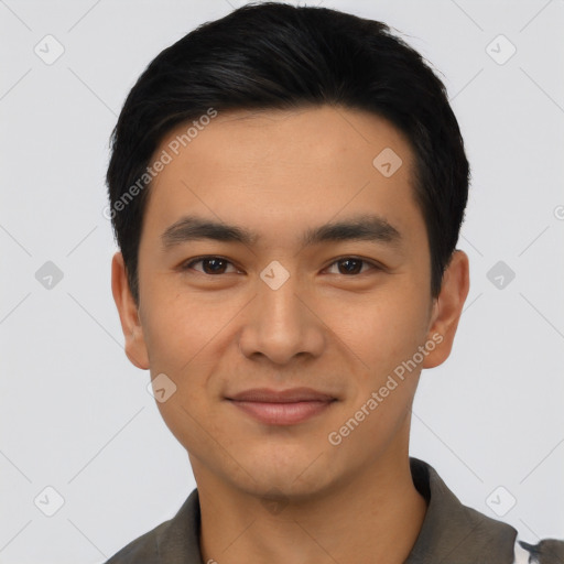 Joyful asian young-adult male with short  black hair and brown eyes