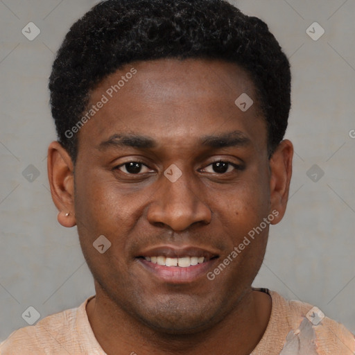 Joyful black young-adult male with short  black hair and brown eyes