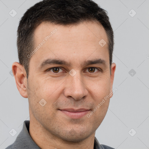 Joyful white adult male with short  brown hair and brown eyes