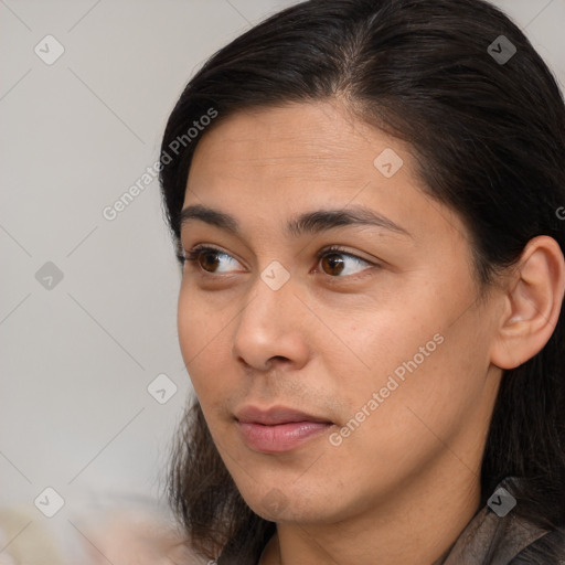 Neutral white young-adult female with medium  brown hair and brown eyes