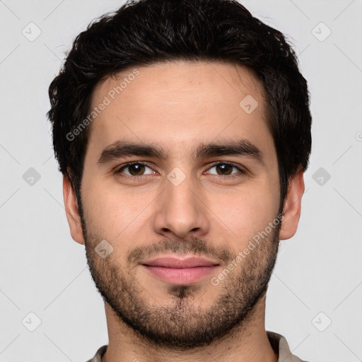 Joyful white young-adult male with short  black hair and brown eyes