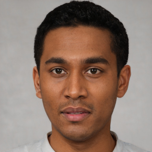 Neutral latino young-adult male with short  black hair and brown eyes