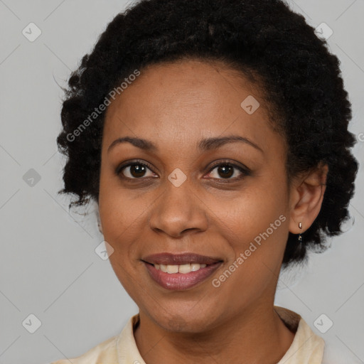 Joyful latino adult female with short  brown hair and brown eyes