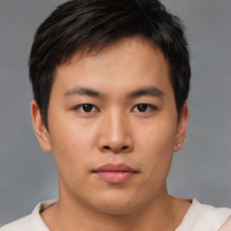 Neutral asian young-adult male with short  brown hair and brown eyes