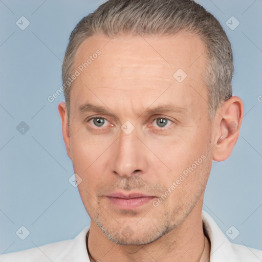 Neutral white adult male with short  brown hair and brown eyes