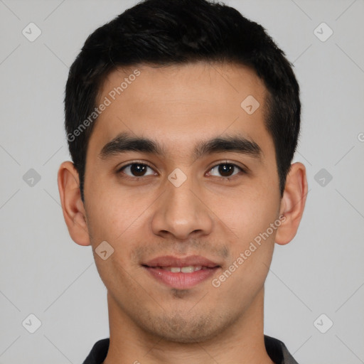 Joyful latino young-adult male with short  black hair and brown eyes