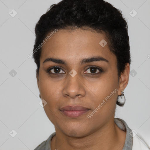 Joyful latino young-adult female with short  black hair and brown eyes