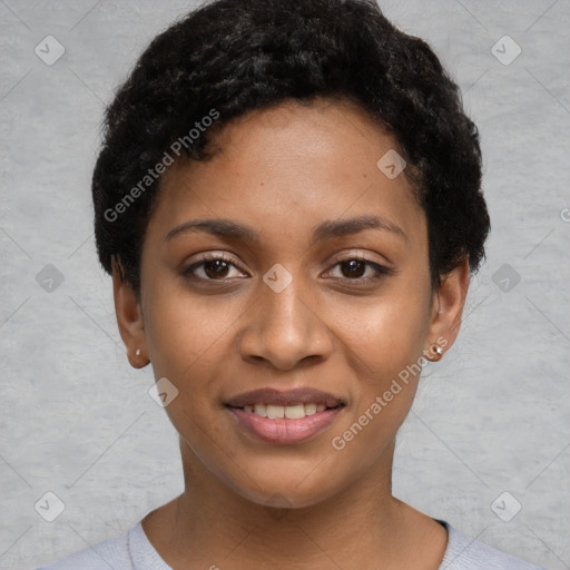 Joyful black young-adult female with short  black hair and brown eyes