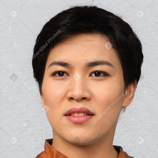 Joyful asian young-adult female with short  black hair and brown eyes