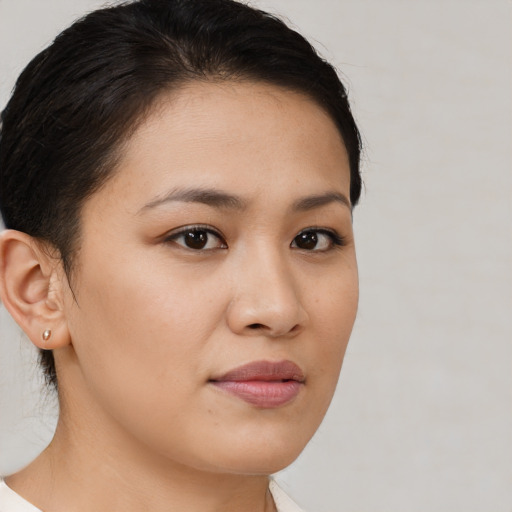 Neutral white young-adult female with short  brown hair and brown eyes