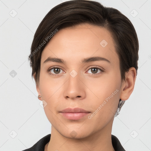 Neutral white young-adult female with short  brown hair and brown eyes