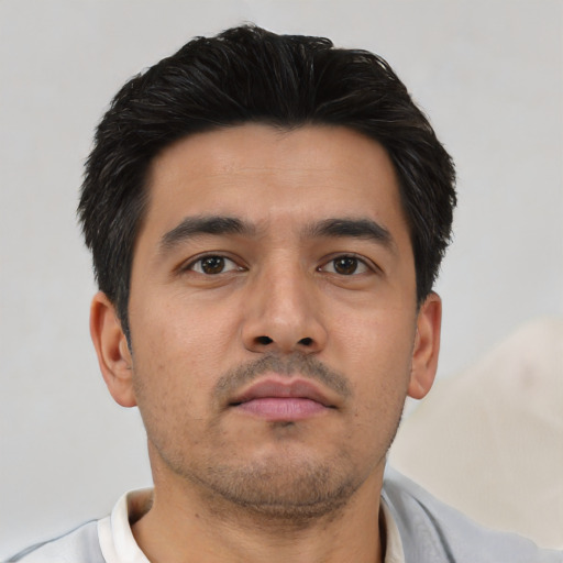 Neutral asian young-adult male with short  brown hair and brown eyes
