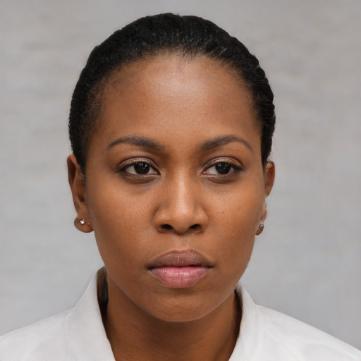 Neutral black young-adult female with short  brown hair and brown eyes