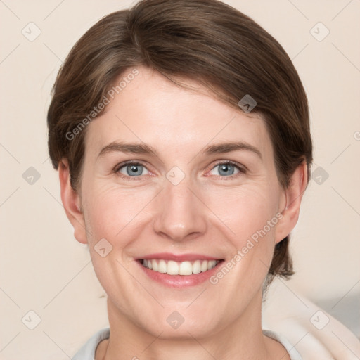 Joyful white young-adult female with medium  brown hair and grey eyes